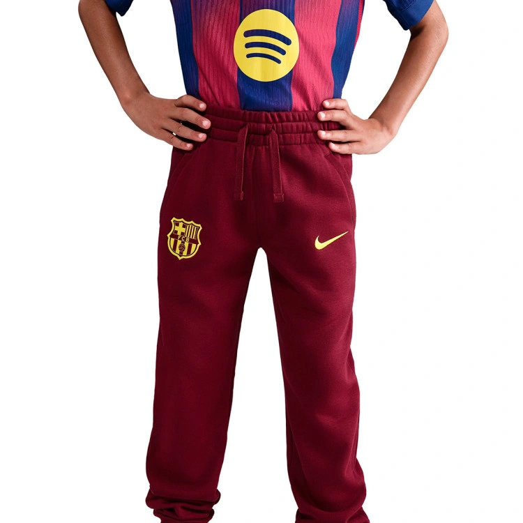 pantalon-largo-nike-fc-barcelona-fanswear-2025-2026-nino-team-red-opti-yellow-no-sponsor-2