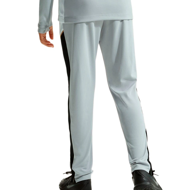 pantalon-largo-nike-academy-25-nino-lt-smoke-grey-white-black-metallic-gold-1